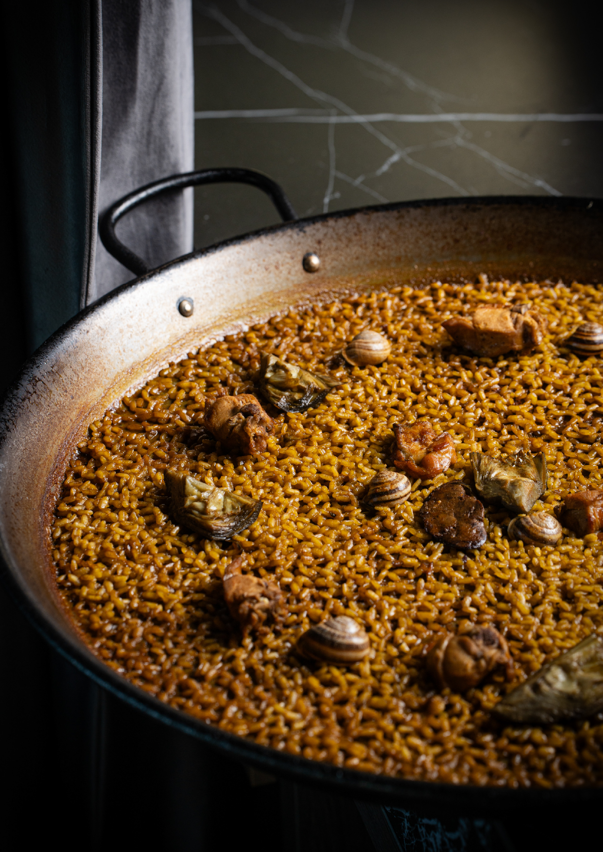Arroz de conejo y caracoles